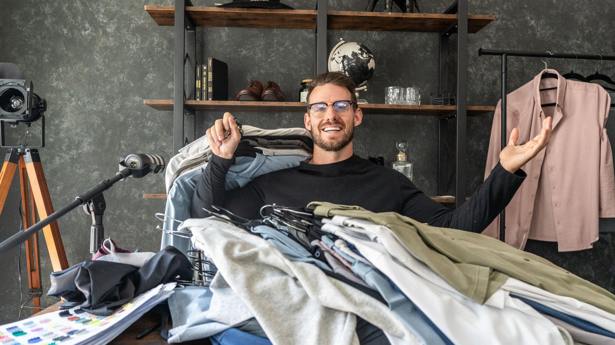 Sean with a pile of Noble Threads samples